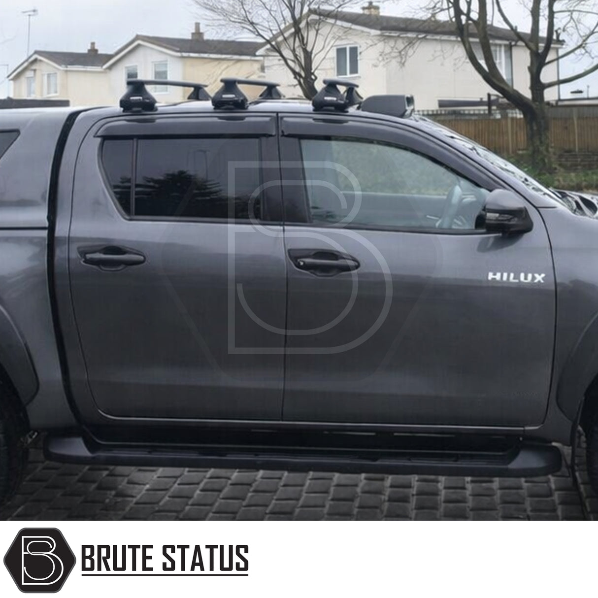 Toyota Hilux 2015+ premium black acrylic wind deflectors fitted – front and rear 4-piece set with aerodynamic design and 3M adhesive installation