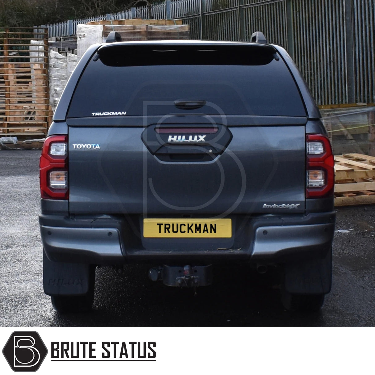Toyota Hilux Invincible X with Truckman GLS Hardtop Canopy, featuring remote locking and tinted windows, enhancing storage and ventilation for pet-friendly transport.