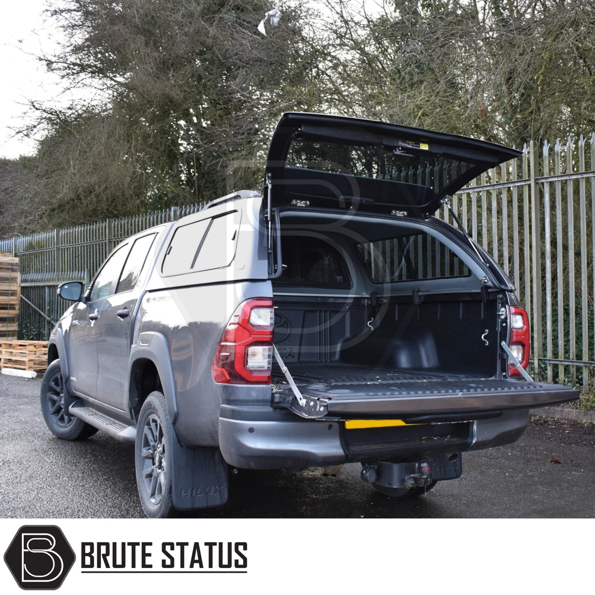 Toyota Hilux Invincible X with Truckman GLS Hardtop Canopy, showcasing rear access with open canopy and tailgate, highlighting secure, ventilated, and versatile load space.