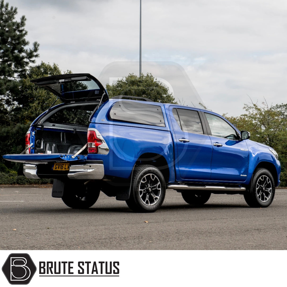 Toyota Hilux Invincible X 2016+ MK8, MK9 Truckman Grand Hardtop Canopy with open tailgate, showcasing increased storage space and remote locking feature.