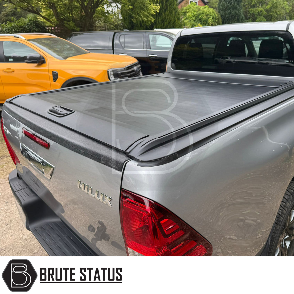 Black manual roller shutter for toyota hilux 2015-2021 pickup truck. Durable, high-quality design for secure cargo protection and easy manual operation