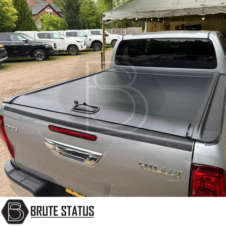 Black manual roller shutter for toyota hilux 2015-2021 pickup truck. Durable, high-quality design for secure cargo protection and easy manual operation
