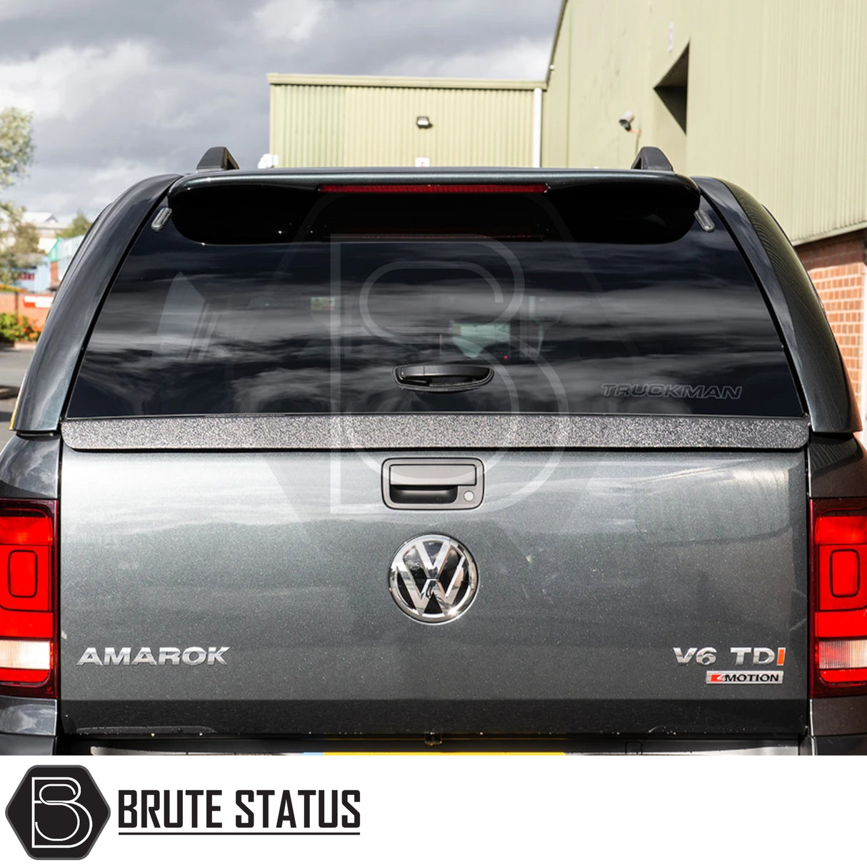 Volkswagen Amarok 2010-2022 Truckman GLS Hardtop Canopy with remote locking and sliding windows, enhancing load space and security. Tailgate features Amarok and V6 TDI 4MOTION badges.