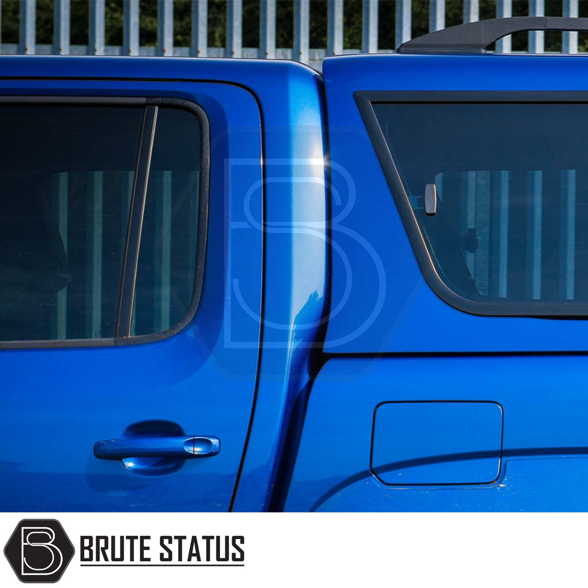 Volkswagen Amarok 2010-2022 Truckman GLS Hardtop Canopy with heated rear window and remote locking, featuring a Brute Status logo on a bright blue truck.