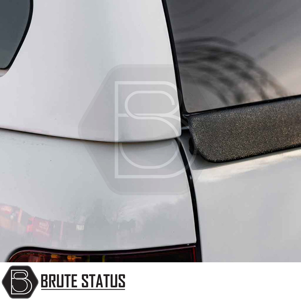Close-up of a Volkswagen Amarok 2010-2022 Truckman Grand Hardtop Canopy, highlighting the rear hatch seam, black trim, and taillight edge for secure, stylish cargo storage.