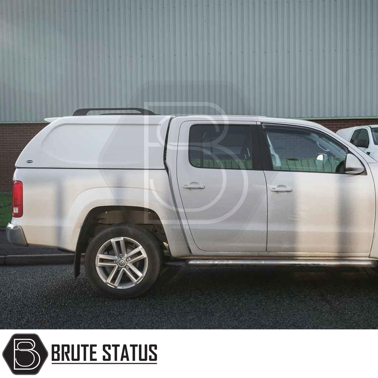 Volkswagen Amarok 2010-2022 Truckman L-Series Hardtop Canopy with solid sides, enhancing security and storage, shown on a pickup truck.
