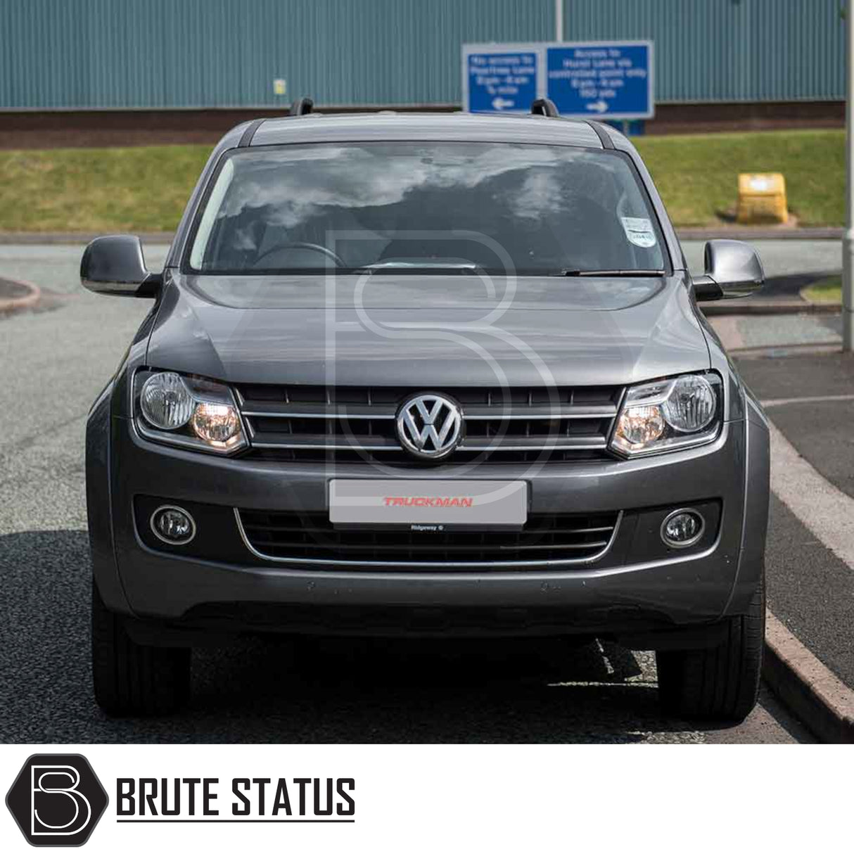 Volkswagen Amarok 2010-2022 Truckman L-Series Hardtop Canopy with stylish, solid-sided design, enhancing security and storage capacity; VW badge and headlights visible.