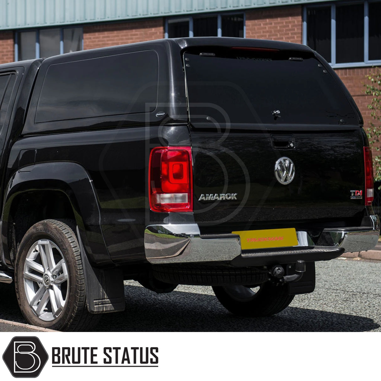 Volkswagen Amarok 2010-2022 Truckman RS Hardtop Canopy with solid rear window and remote locking, shown on a black pickup, enhancing security and utility.