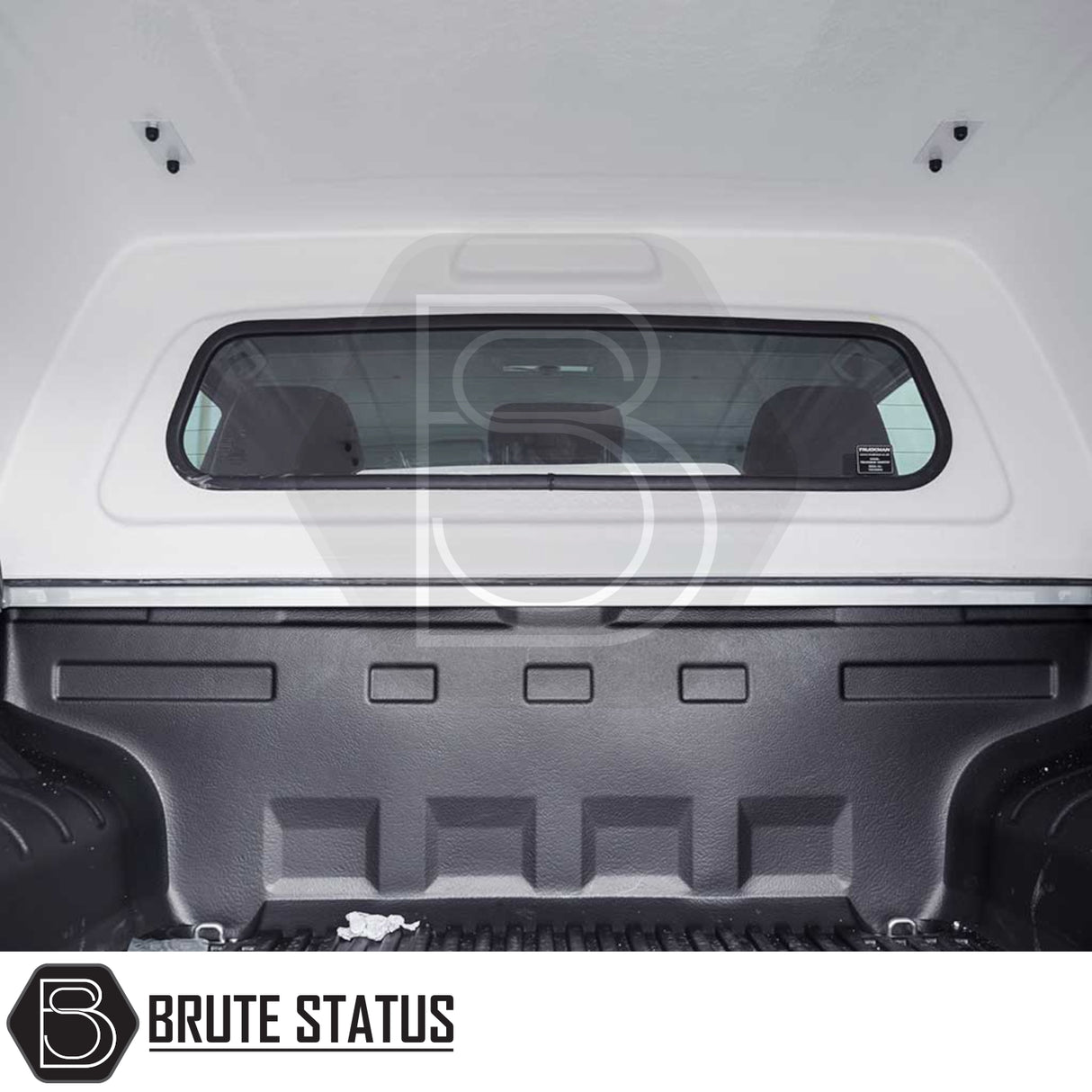 Volkswagen Amarok 2010-2022 Truckman RS Hardtop Canopy with solid rear window and remote locking, featuring a durable white fiberglass topper and secure black bed liner.