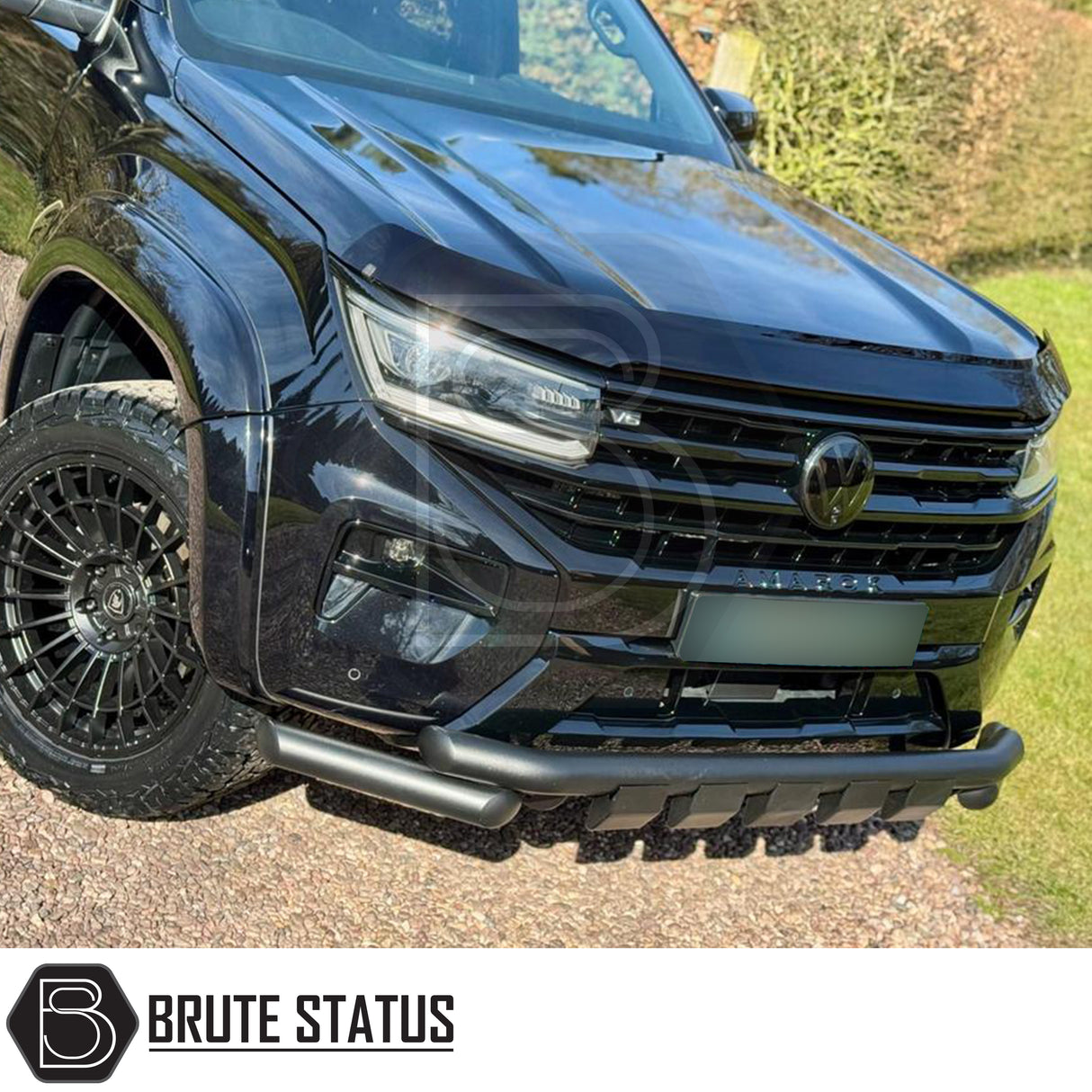 Volkswagen Amarok 2023+ City Bar (Matt Black) with aftermarket bull-bar, skid-plate, and alloy wheels, promoting Brute Status's off-road accessories.