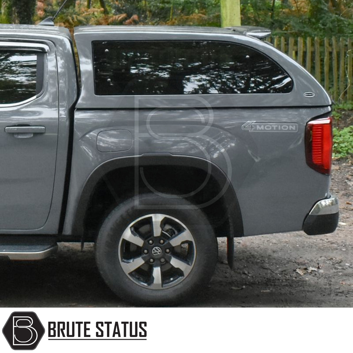 Volkswagen Amarok 2023+ Truckman Grand Hardtop Canopy with remote locking, showcasing rear quarter view with canopy, 4MOTION badge, wheel, and Brute Status branding.