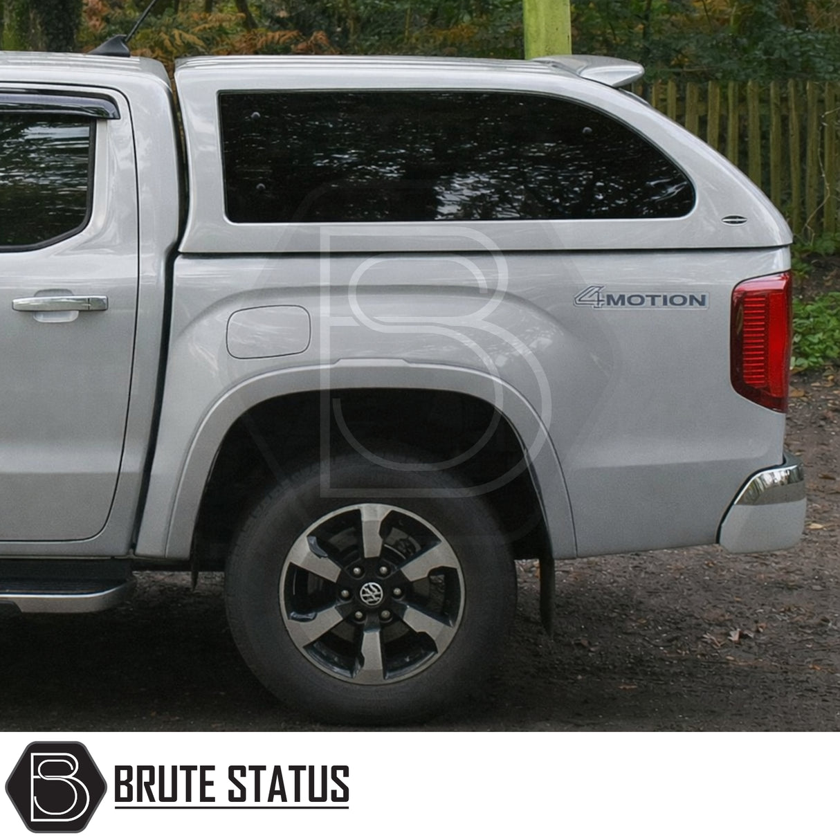 Volkswagen Amarok 2023+ Truckman Grand Hardtop Canopy with remote locking, shown in rear three-quarter view with tinted canopy window and 4MOTION badging.