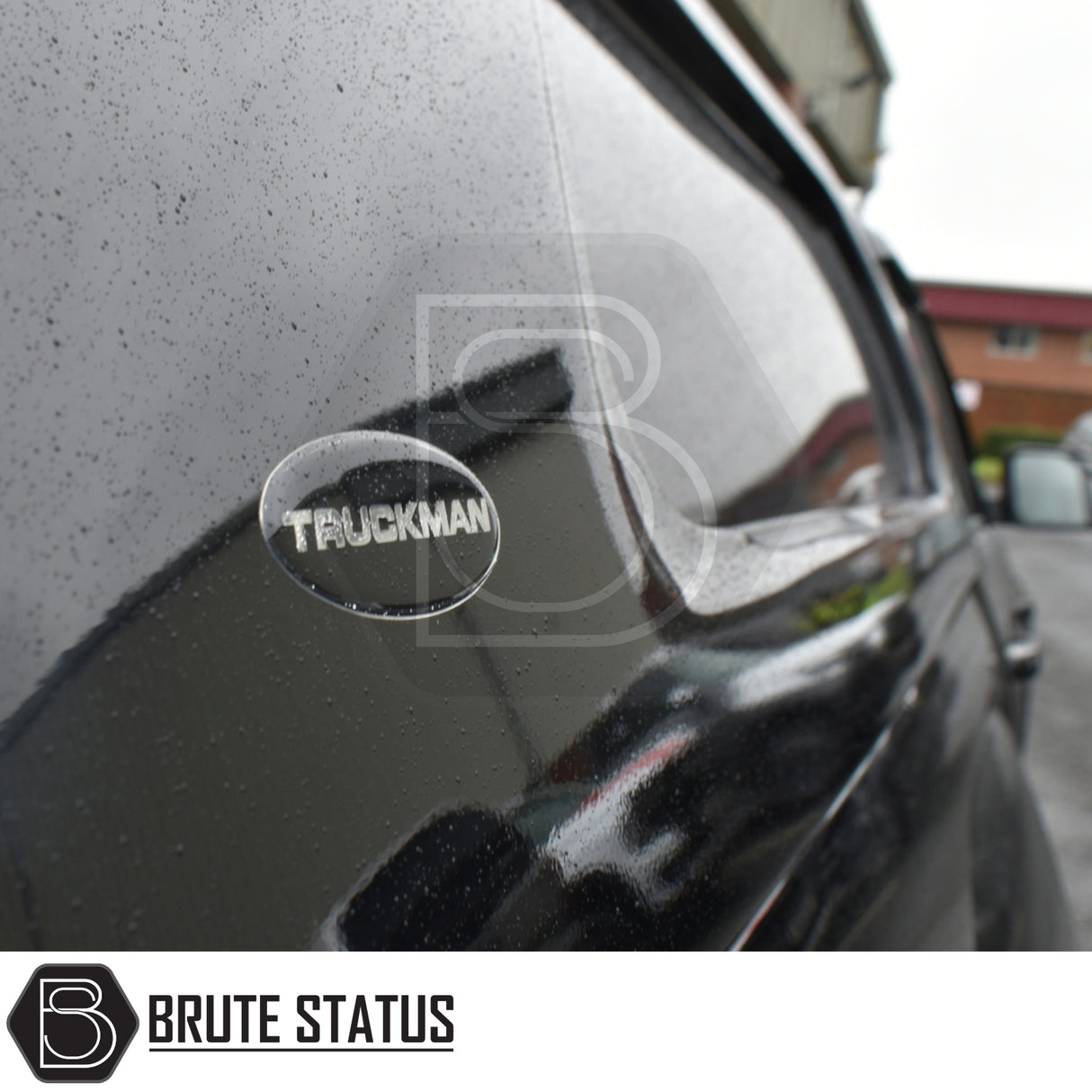 Close-up of Volkswagen Amarok 2023+ Truckman L-Series Hardtop Canopy with raindrops and “TRUCKMAN” badge, highlighting secure, remote-locking design for enhanced truck storage.