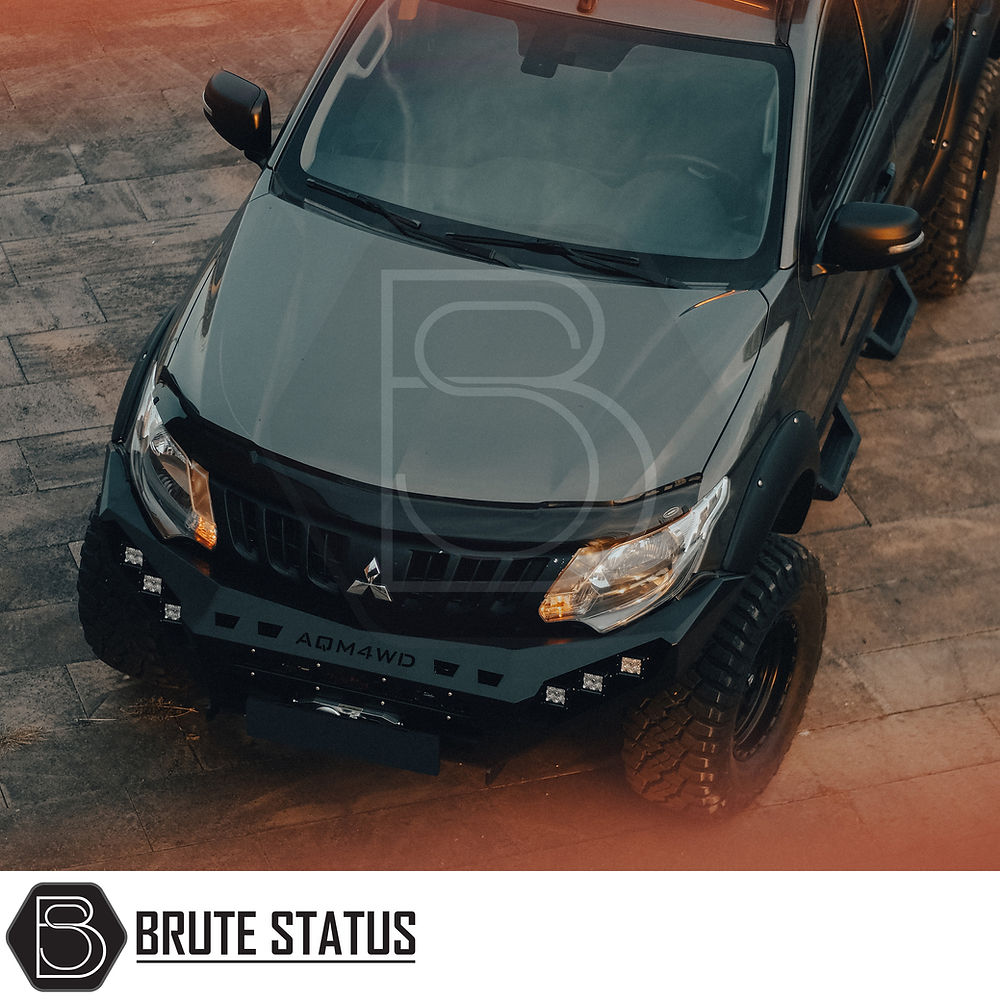 Fiat Fullback 2015-2019 heavy-duty winch front bumper with matte black finish and LED lights, suitable for professional installation on pick-up trucks.