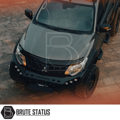 Fiat Fullback 2015-2019 heavy-duty winch front bumper with matte black finish and LED lights, suitable for professional installation on pick-up trucks.