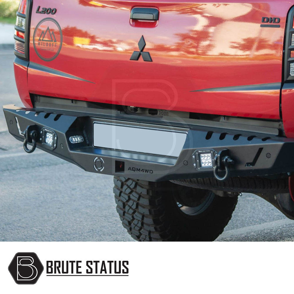Mitsubishi L200 Series 6 2019-2021 Rear Bumper Matt Black, showcasing a stylish, durable design with integrated lights and sensor-ready knock-out holes.