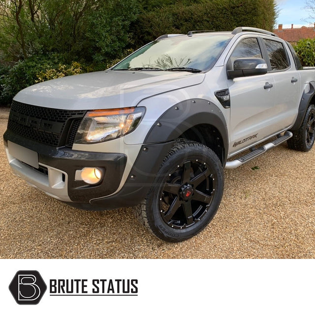 Ford Ranger Roof Rail Kit 2012-2022 installed on a silver truck, showcasing its fit and design for enhancing vehicle utility and style.