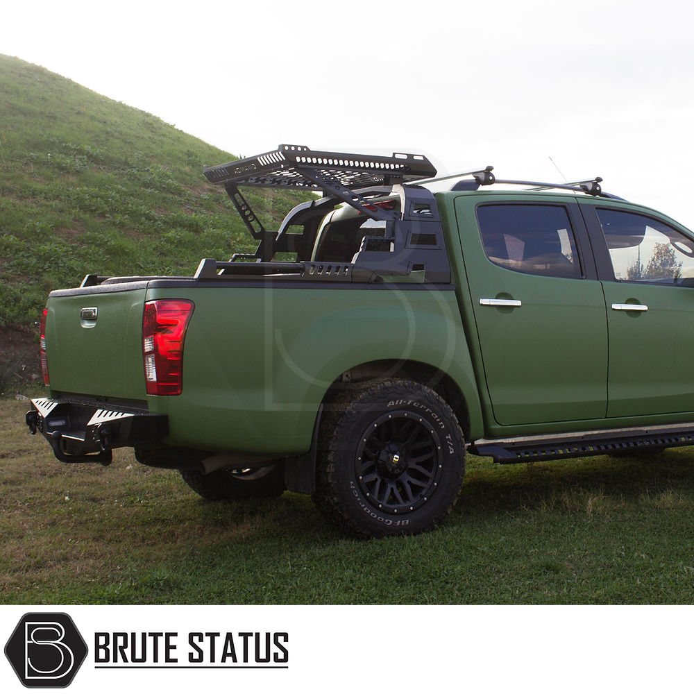 Volkswagen Amarok 2010-2022 S10 Combat Roll Bar with Storage Basket features matte black steel, mounted above bed, visible off-road wheels, and tires.