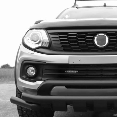 Front view of a customized Fiat Fullback with distinctive grille and bumper, highlighting aftermarket enhancements from Brute Status for a more unique and desirable appearance.