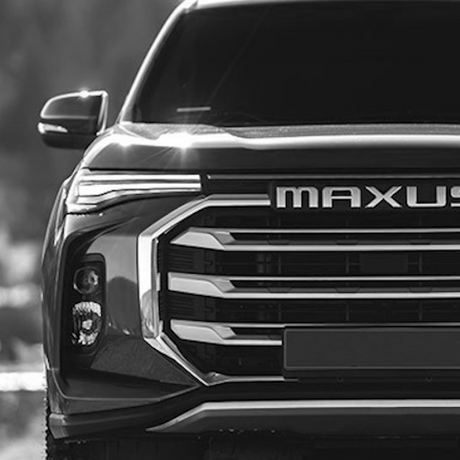 Close-up of the front grille of a Maxus T90, highlighting its distinctive design, reflecting Brute Status's focus on customizing pickup trucks.