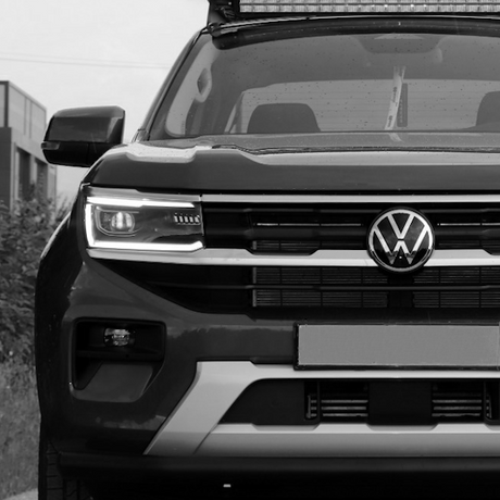 Front view of a 2023 VW Amarok, showcasing bumper and grille design, reflecting Brute Status's focus on unique aftermarket accessories for enhanced vehicle appeal.
