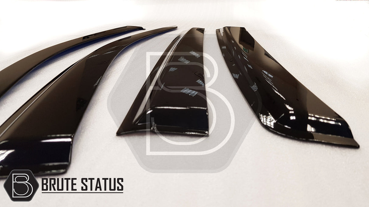 Isuzu D-Max 2012-2021 Window Deflector Sun Shade, a sleek black acrylic deflector designed for rain protection and easy installation, shown on a white surface.