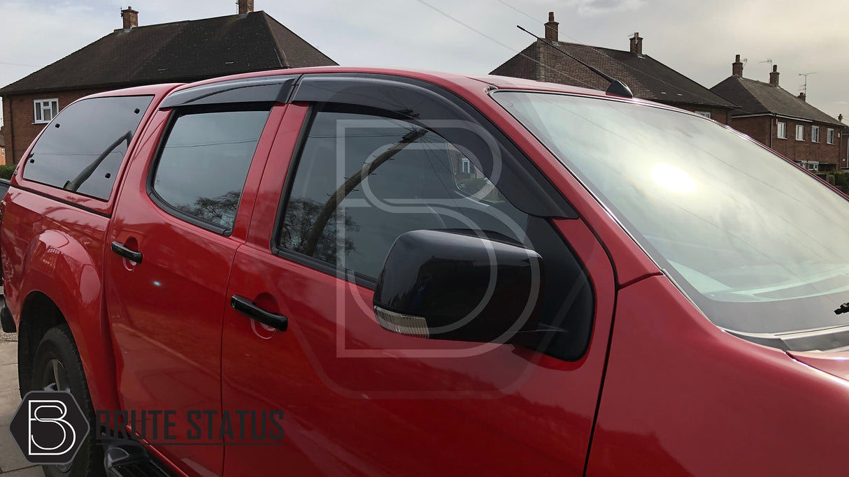 Isuzu D-Max 2012-2021 window deflector sun shade, shown in close-up on a car, highlighting its aerodynamic, durable design and easy installation.