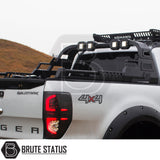 Matte black carbon steel heavy duty roll bar fitted to white Ford Ranger pickup truck offroad 4x4 vehicle, suitable for overlanding set ups. 