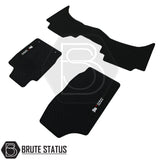 Ford Ranger 2012-2019 T6 & T7 Wildtrak Double Cab Rubber Floor Mats with honeycomb pattern and UK Custom Covers logo, tailored for right-hand drive vehicles.
