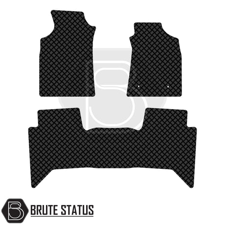 Toyota Hilux 2011-2016 Double Cab Rubber Floor Mats set with diamond-plate pattern, featuring two front and two rear mats by Brute Status.