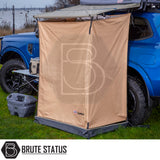 ARB Ensuite Room & Instant Shower Tent on blue 4x4, featuring Brute Status annex, ARB shower unit, camp table with cooler, ideal for private outdoor showering.