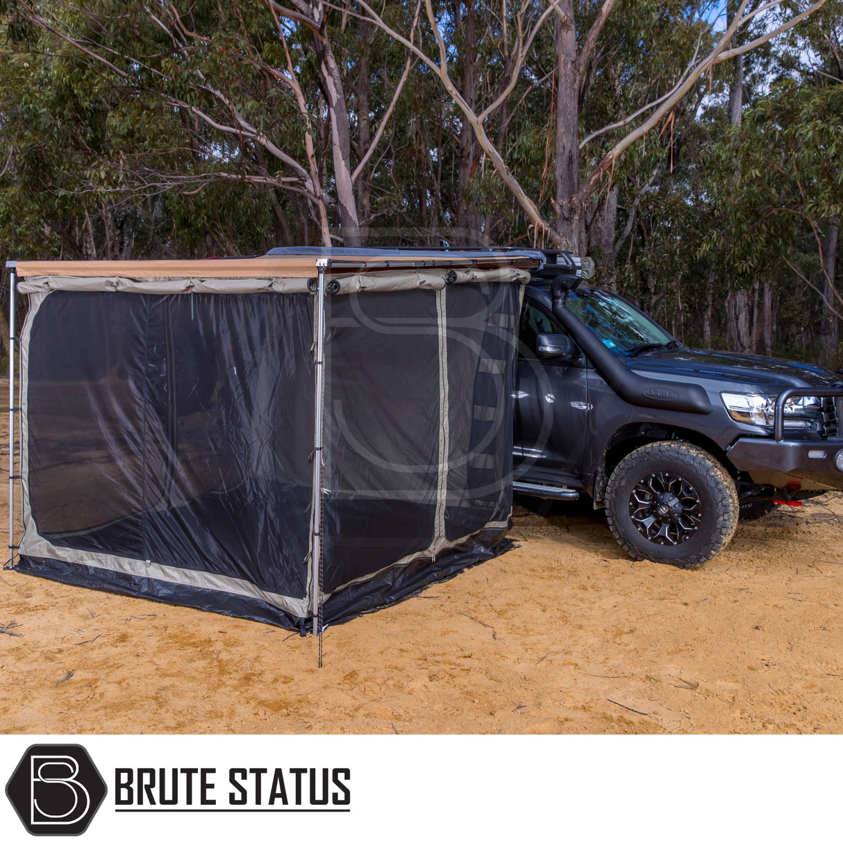 ARB Flinders Rooftop Tent on black 4x4 ute, with fold-out awning and side-annex, offering a compact camping solution for two adults.