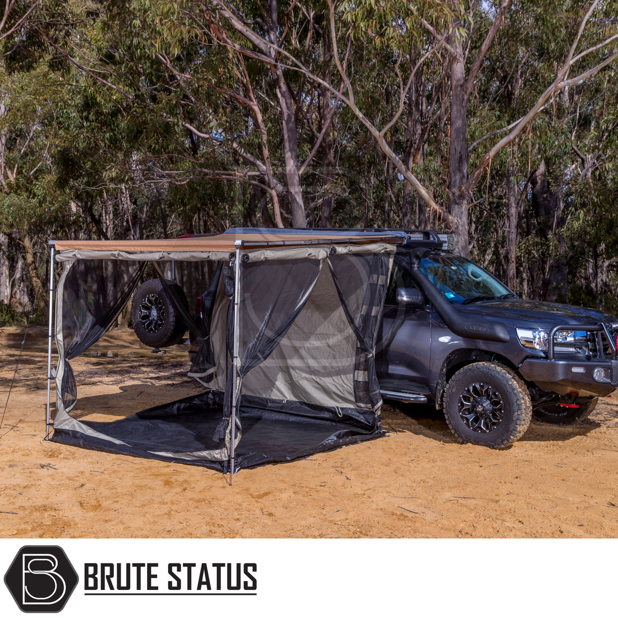 ARB PVC Case Awning & LED Light Kit set up on a 4x4 pick-up with overlanding gear, featuring an extended canopy and mesh-walled annex.