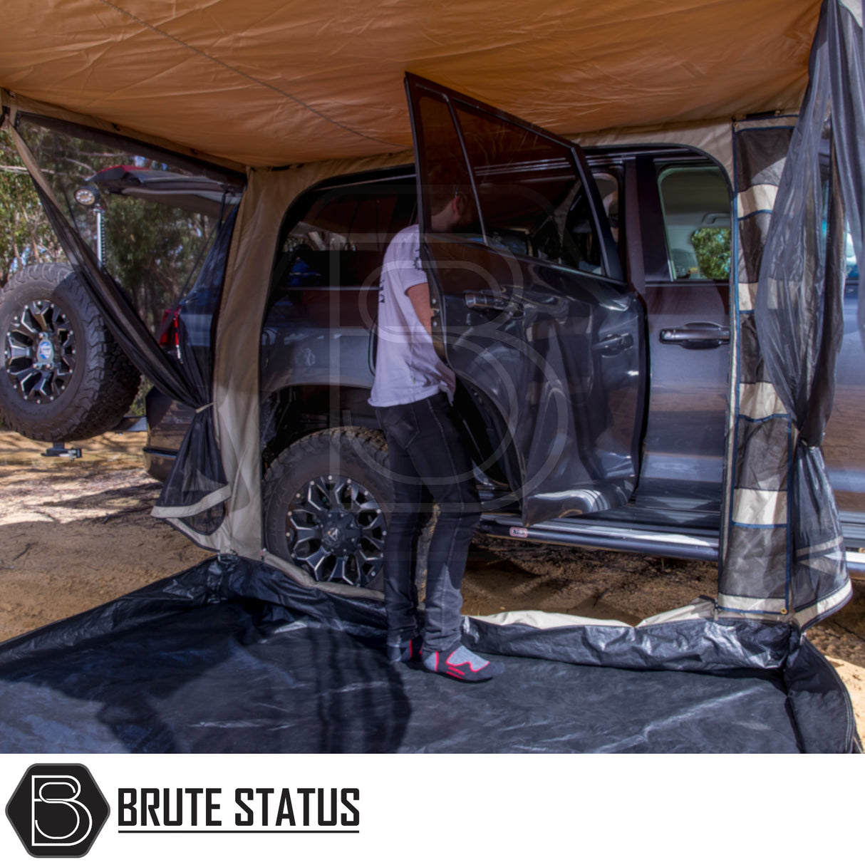 ARB Simpson III Rooftop Tent & Annex attached to a dark 4x4, showcasing the annex's spacious, durable design suitable for outdoor adventures.