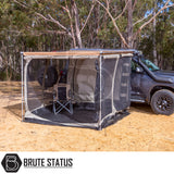ARB Awning with Light Black Aluminium Case 3m x 2.5m, attached to SUV with mesh-walled annex, showcasing Brute Status' vehicle-mounted campsite enclosure.