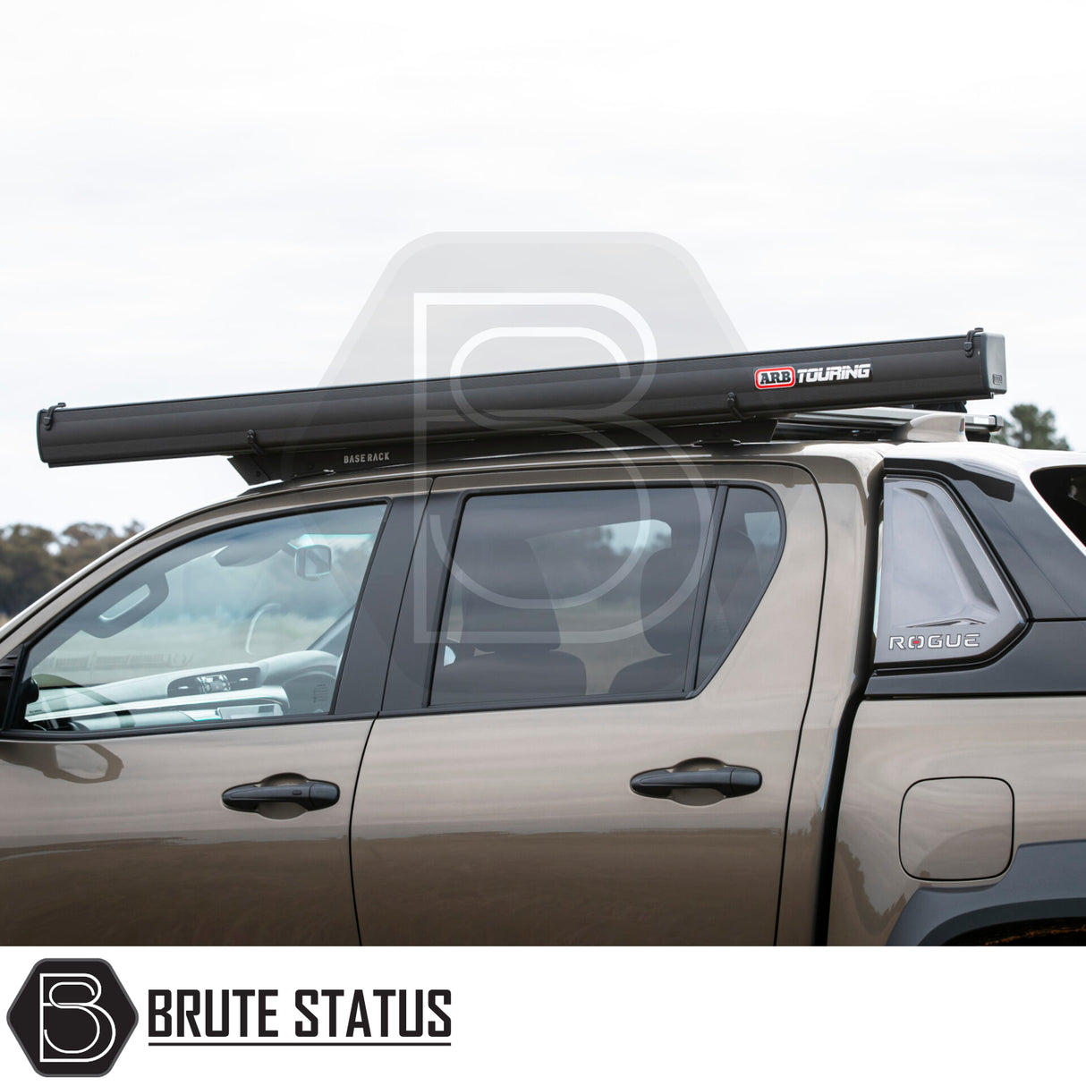 Pickup truck with ARB Aluminium Case Awning & LED Light Kit on roof rack, showcasing aftermarket accessories for enhanced individuality and functionality.