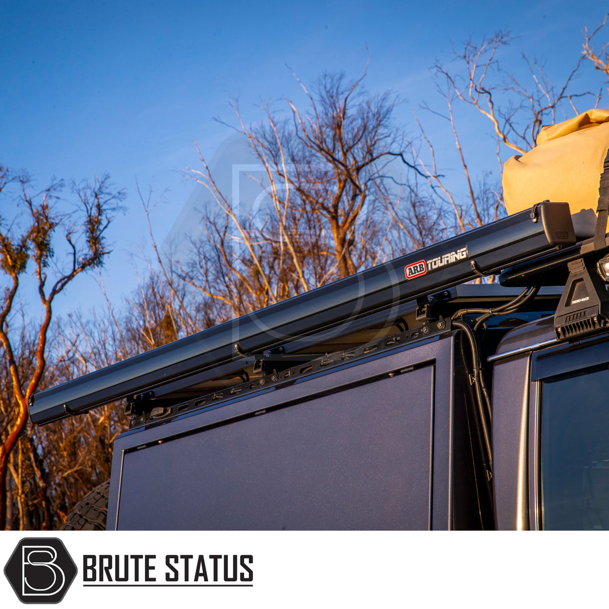 Close-up of ARB Aluminium Case Awning & LED Light Kit on a roof rack, featuring durable design for off-road vehicles, emphasizing versatility and convenience.
