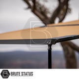 Close-up of ARB Aluminium Case Awning, showcasing tan canopy and bracket with ARB logo, part of a versatile 2.5m x 2.5m overland setup.
