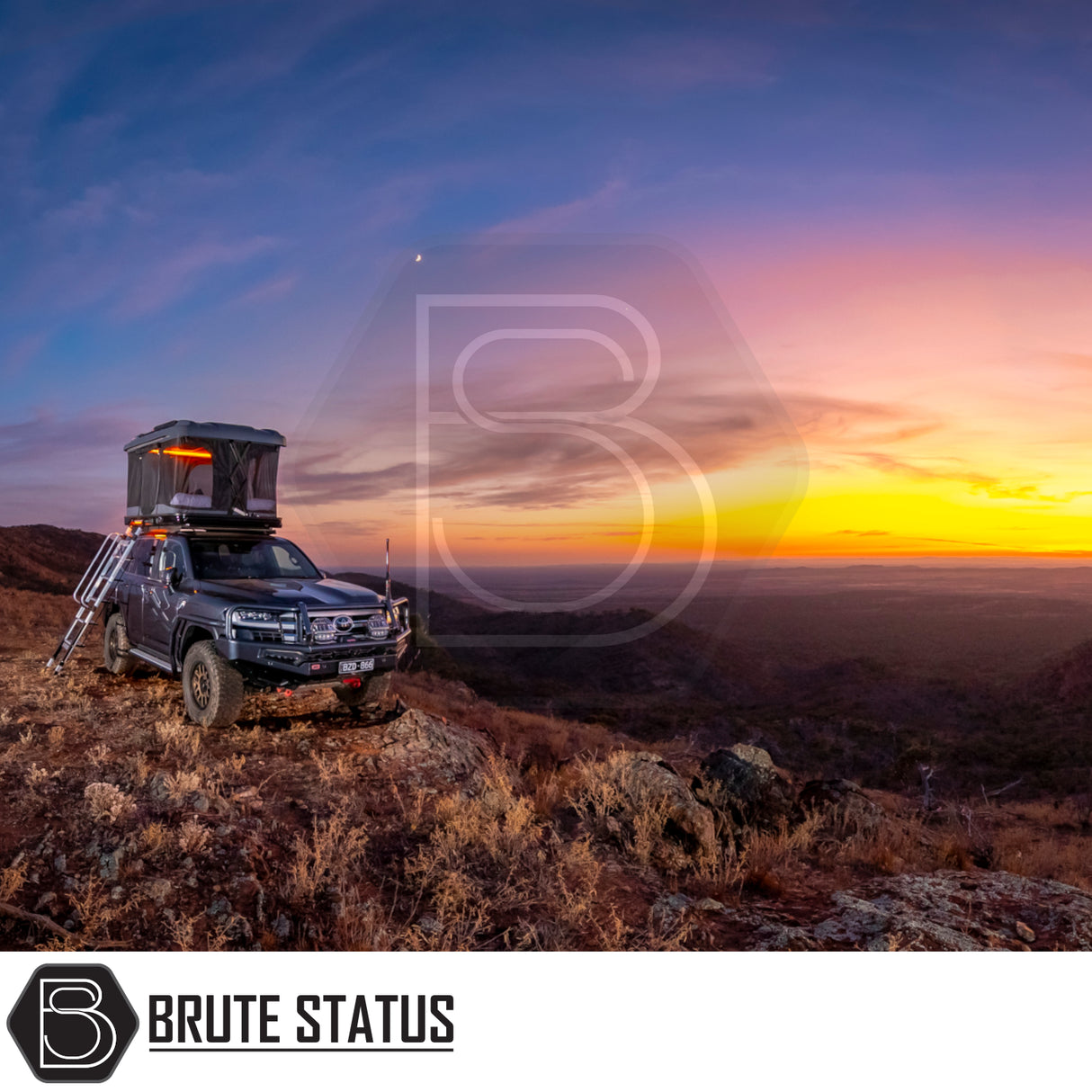 Rugged 4x4 on hilltop with ARB Altitude Rooftop Tent, showcasing automated setup. Ideal for off-grid touring, blending luxury with convenience.