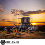 ARB Altitude Rooftop Tent on a LandCruiser at sunset camp, showcasing automated setup, comfort features, and off-road capability with Brute Status branding.