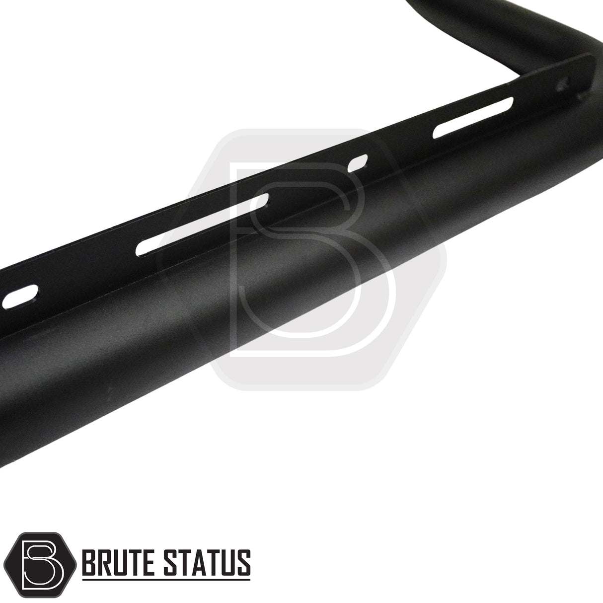 Matte black powder-coated steel city bar mounted to a pickup truck, designed to protect the front bumper and attach directly to the chassis rails using U-brackets for a simple no-drill installation.
