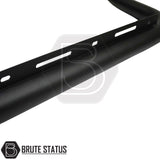 Matte black powder-coated steel city bar mounted to a pickup truck, designed to protect the front bumper and attach directly to the chassis rails using U-brackets for a simple no-drill installation.