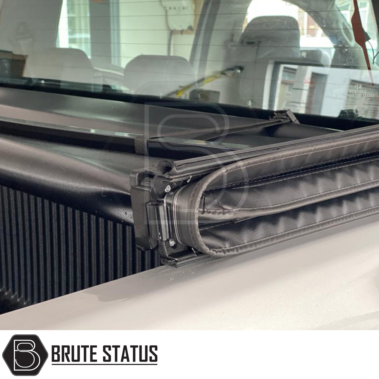 "Premium tri-fold tonneau cover for pickup trucks, featuring UV-stable vinyl, rubber perimeter seals, reinforced corners, and shaped aluminium cross bars for improved durability, aerodynamics, and water resistance. Easy no-drill installation. Not compatible with Wildtrak models with sports bars.