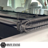"Premium tri-fold tonneau cover for pickup trucks, featuring UV-stable vinyl, rubber perimeter seals, reinforced corners, and shaped aluminium cross bars for improved durability, aerodynamics, and water resistance. Easy no-drill installation. Not compatible with Wildtrak models with sports bars.