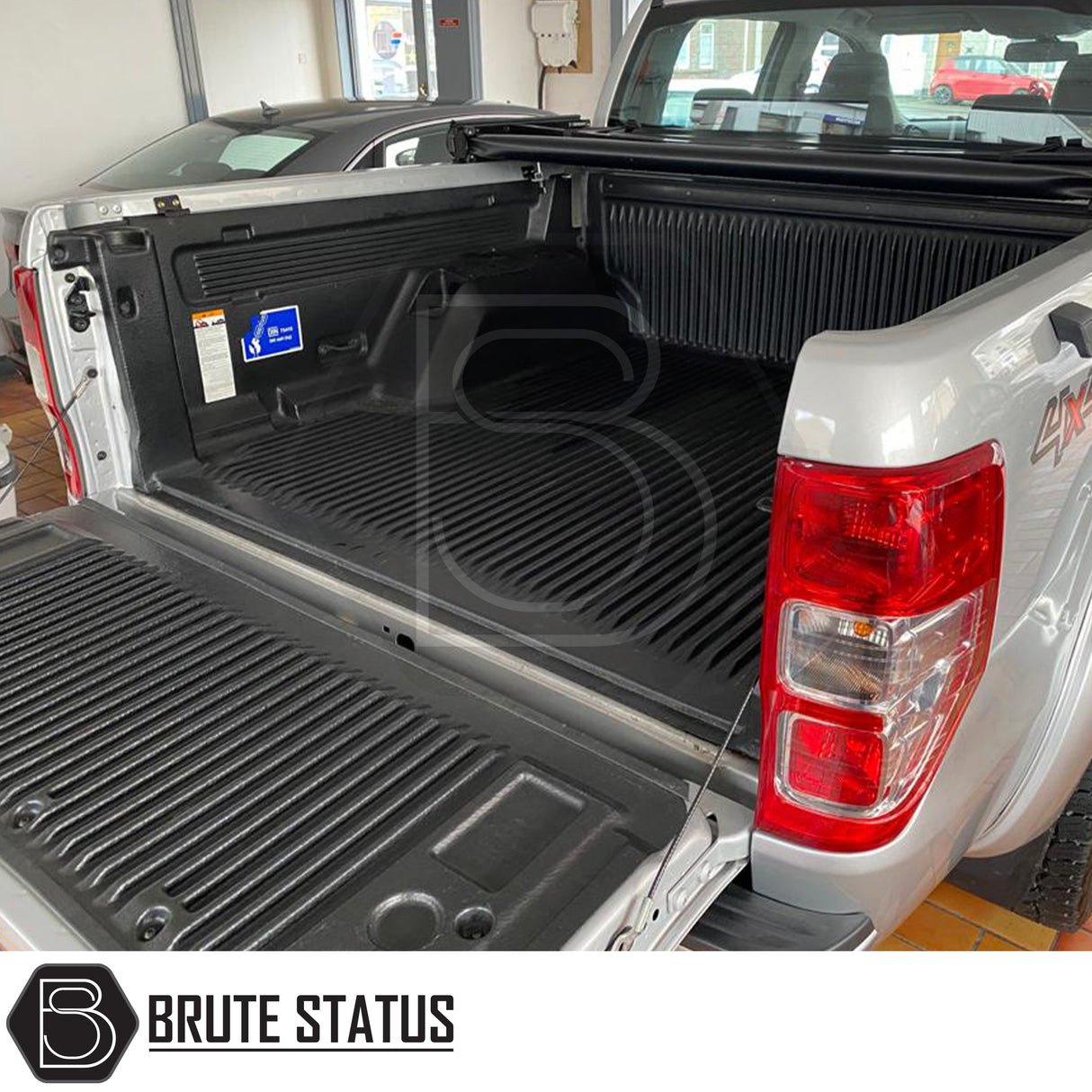 "Premium tri-fold tonneau cover for pickup trucks, featuring UV-stable vinyl, rubber perimeter seals, reinforced corners, and shaped aluminium cross bars for improved durability, aerodynamics, and water resistance. Easy no-drill installation. Not compatible with Wildtrak models with sports bars.