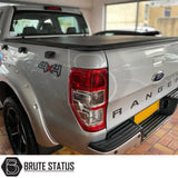 "Premium tri-fold tonneau cover for pickup trucks, featuring UV-stable vinyl, rubber perimeter seals, reinforced corners, and shaped aluminium cross bars for improved durability, aerodynamics, and water resistance. Easy no-drill installation. Not compatible with Wildtrak models with sports bars.