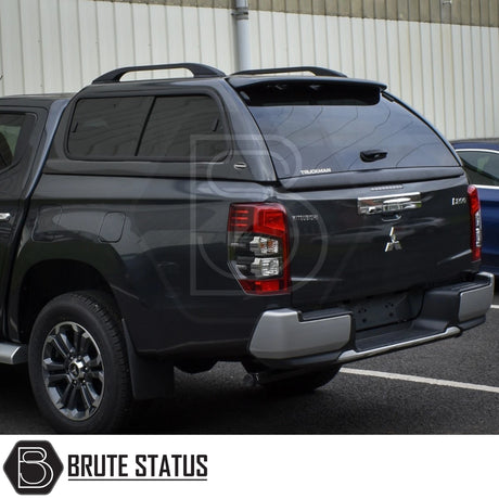 Fiat Fullback/Mitsubishi L200 2015-2021 Truckman GLS Hardtop Canopy with tinted windows and roof rails, showcasing the sporty, secure, and ventilated design.