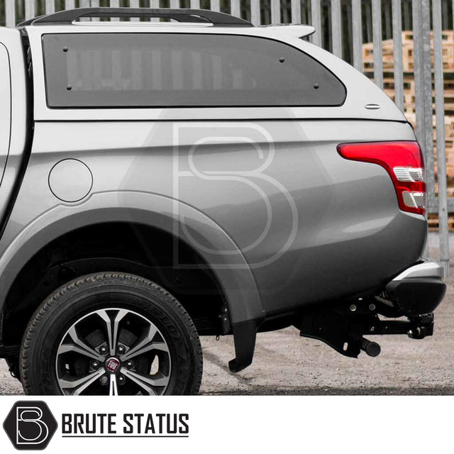 Fiat Fullback/ Mitsubishi L200 Truckman Grand Hardtop Canopy with remote locking, stylish design, and enhanced storage, shown on a gray pickup truck with Brute Status branding.