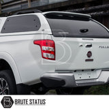 Fiat Fullback/Mitsubishi L200 Truckman Grand Hardtop Canopy with tinted windows, rear bumper, and tow hitch, showcasing Brute Status' premium accessory upgrade.
