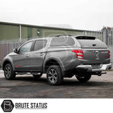 Fiat Fullback/Mitsubishi L200 Truckman Grand Hardtop Canopy fitted on grey pickup, showcasing black alloy wheels, side steps, and tow hitch.